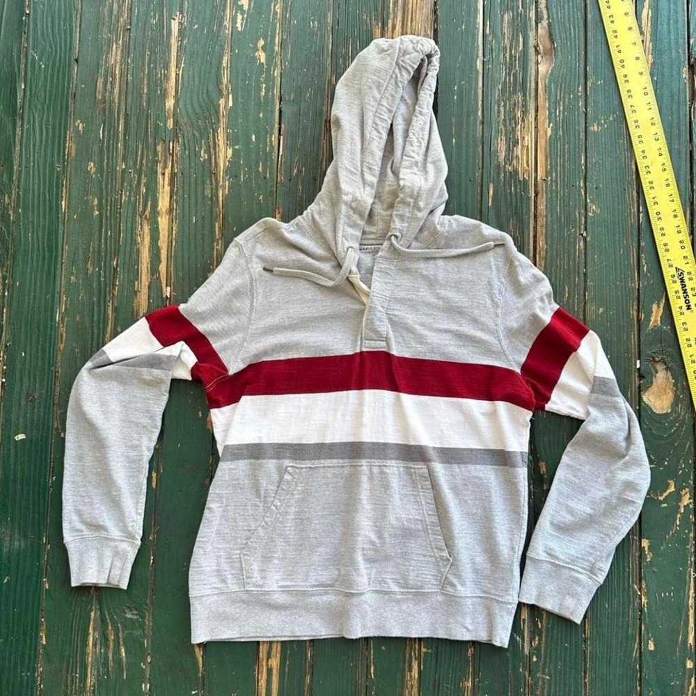 American Eagle Grey and red striped hoodie with a relaxed fit